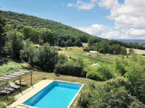 Maison charmante à Massaguel avec jardin et piscine partagée.